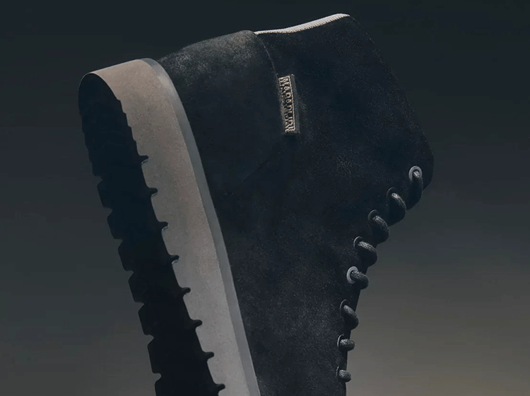 Napapijri winter boot side view, close-up showing textured sole and heel construction