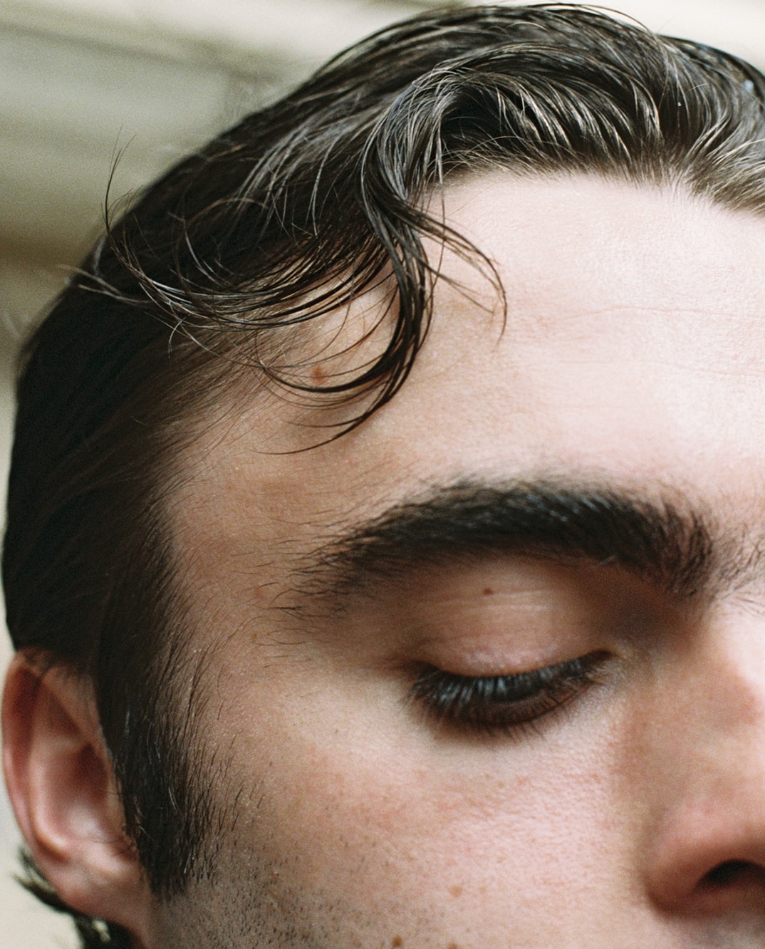 Close-up of face and hair detail used in Napapijri editorial context